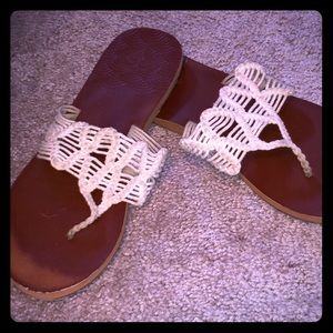 A pair of roxy flip-flops